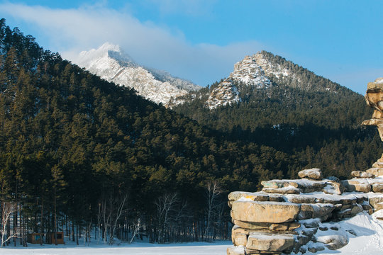 Stone rock in snow. In Kazakhstan Natonal park Burabay (Borovoe)
