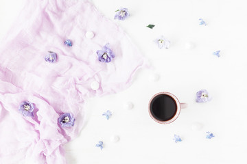 Composition with coffee and lilac flowers. Flat lay, top view