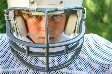  young boy in football uniform