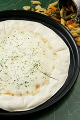 Gorgonzola pizza on table