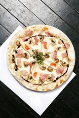 Gorgonzola pizza on table