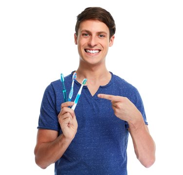 Man with toothbrush.