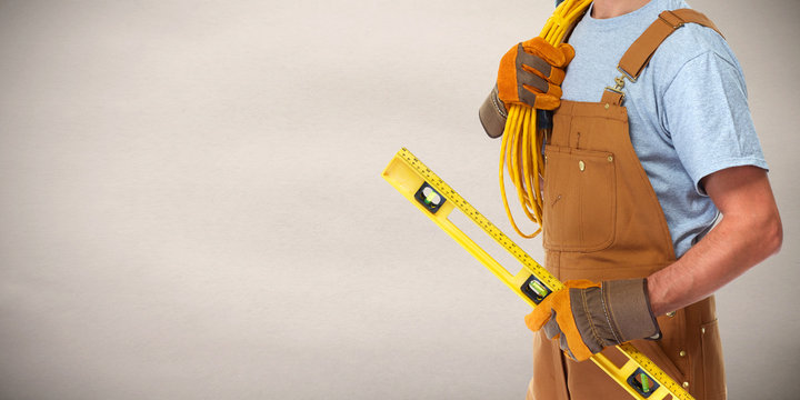 Electrician with electrical cable