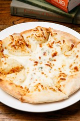 Gorgonzola pizza on table