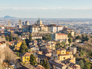 Naklejka premium Bergamo - Old city (Citta Alta). One of the beautiful city in Italy. Lombardia. Landscape of the old city from San Vigilio hill during a beautiful day.