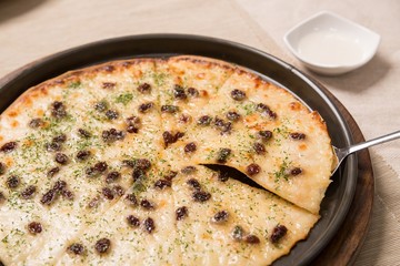 Gorgonzola pizza on table