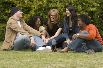Diverse group of people talking and laughing.
