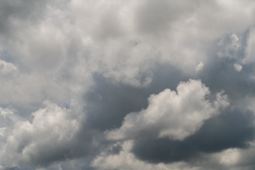 the rain clouds made the sky darkens.