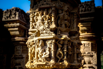 Beautiful sculptures of Hindu god and goddess carved on sandstone pillars in ancient cursed and haunted temple of Kiradu in Eleventh centuary