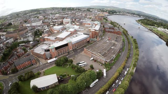 Aerial view of Derry with rooftops and River Foyle