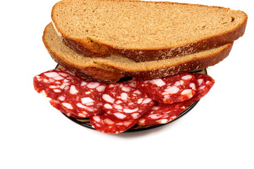 Smoked sausage and bread on a white background