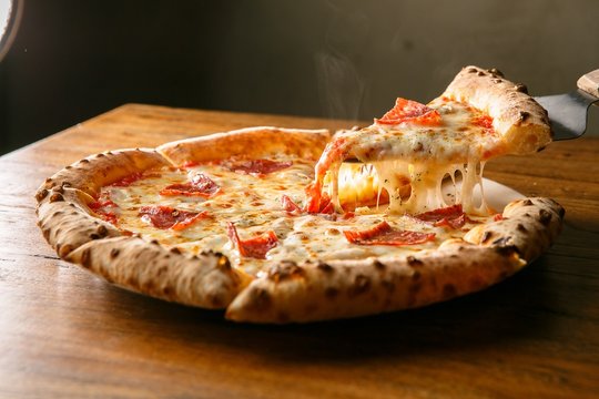 CAPRICCHIOSA pizza on table