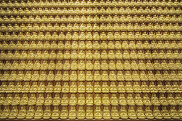 Pattern of golden Chinese Buddha at Wat Leng Nei Yi 2 or Borom Raja Kanchanapisek Anusorn temple in Nonthaburi province, Thailand