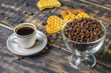 cup of hot coffee with cookies