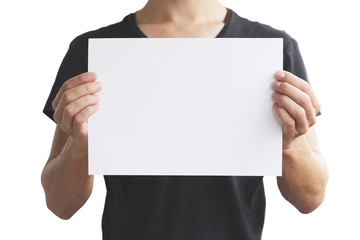 Man in black t shirt holding blank white A4 paper horizontally.