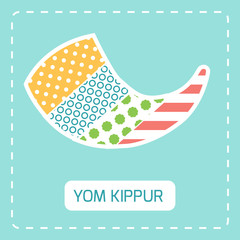 Yom kippur symbol shofar made from different pattern fabric pieces.