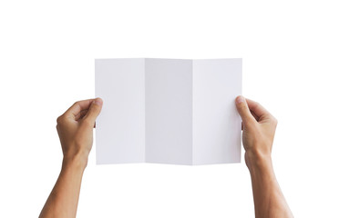 Hand holding blank brochure booklet in the hand. Leaflet present