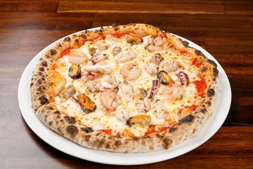 pesto pizza on table