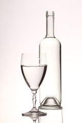 bottle of wine  and a glass 