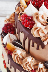 Festive two-tier cake with fruit streaks of chocolate