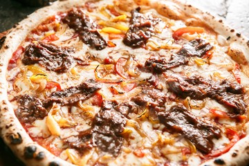 steak pizza on plate