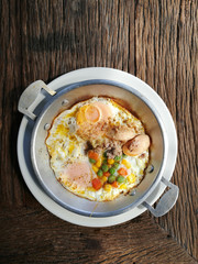 Pan fried egg with pork and toppings