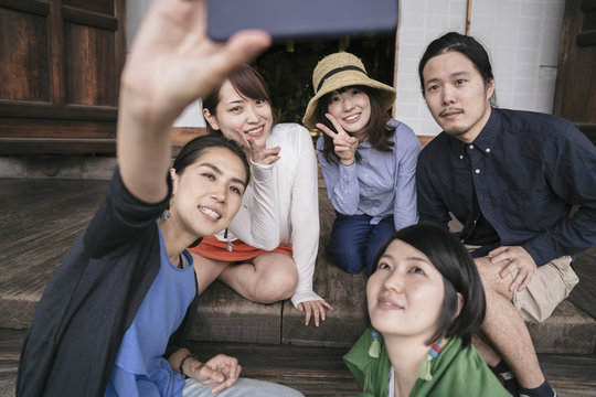 Group of Japanese tourists taking pictures