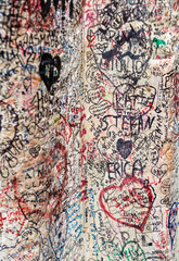 Part of the wall covered with love messages in Juliet house, Verona, Italy