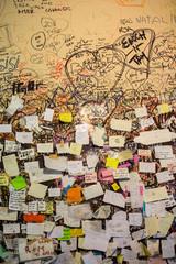 Part of the wall covered with love messages in Juliet house, Verona, Italy