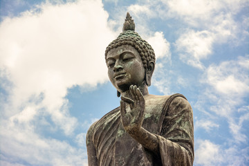 Fototapeta na wymiar Phutthamonthon is a Buddhist park in Nakhon Pathom Province of Thailand. Highlighted by a 15.87 m high Buddha statue which is considered to be the tallest free-standing Buddha statue in the world