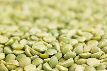 Green dry purified peas macro background. Healthy protein food.