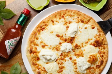 Quattro Formaggi pizza on dish