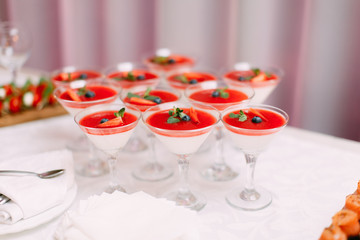 Wedding Party. Red cocktails in glasses ready for party people. Red cocktail at wedding reception.