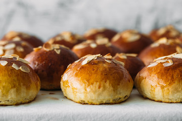 Fresh baked homemade buns on the table for breakfast Baking traditional Swedish semla bread