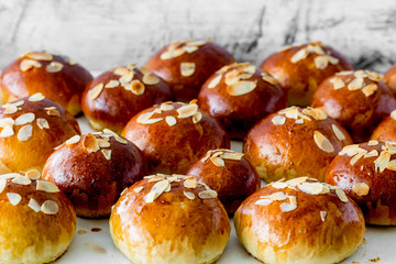 Fresh baked homemade buns on the table for breakfast Baking traditional Swedish semla bread