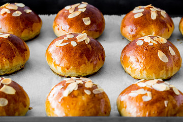 Fresh baked homemade buns on the table for breakfast Baking traditional Swedish semla bread