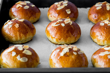 Fresh baked homemade buns on the table for breakfast Baking traditional Swedish semla bread