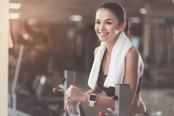 Overjoyed woman smiling after good training