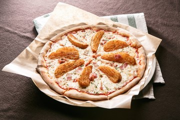 potato pizza on table