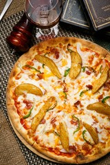 potato pizza on table