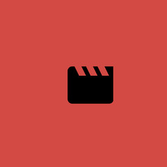 Black clapperboard icon. flat design