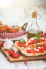 Italian starter, bruschetta with Sicilian red fresh tomato and m
