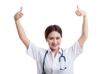 Young Asian female doctor show  two thumbs up.