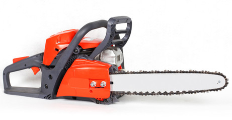 Gasoline chainsaw isolated on white background. Close up on red Gasoline Chainsaw.