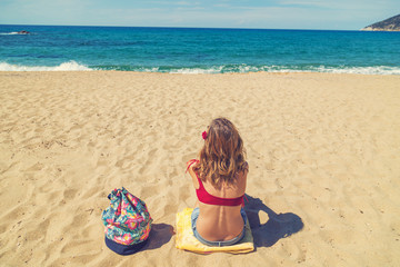 Girl enjoying on a beach