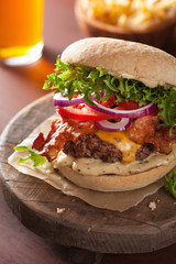 bacon cheese burger with beef patty tomato onion beer