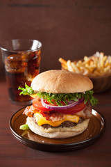 bacon cheese burger with beef patty tomato onion