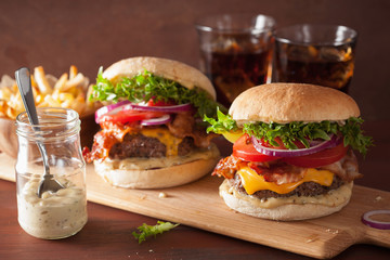 bacon cheese burger with beef patty tomato onion