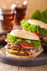 bacon cheese burger with pickles tomato onion