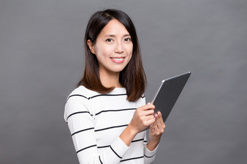 Fototapeta premium Woman using digital tablet computer